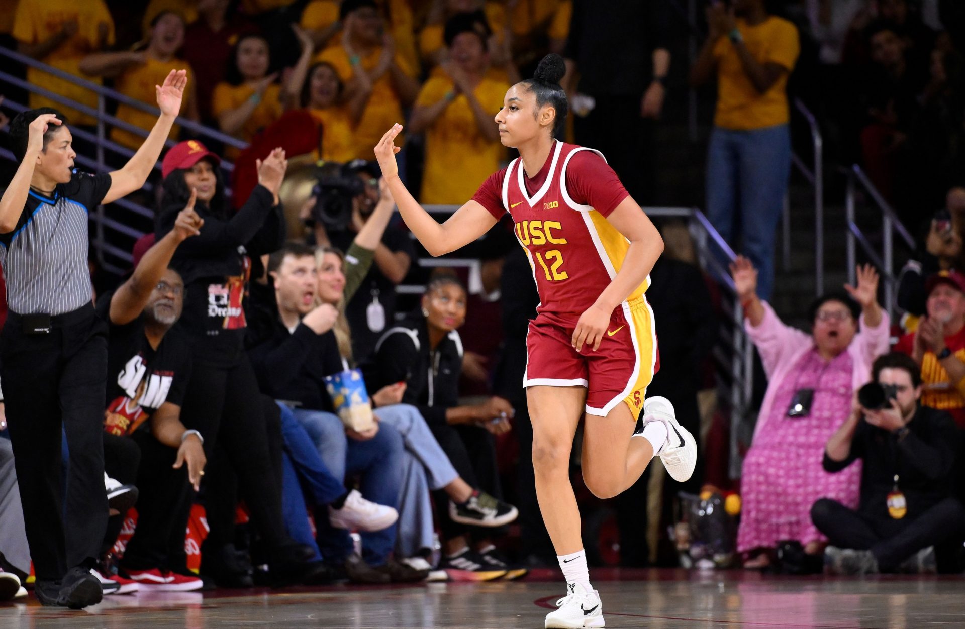 USC Trojans guard JuJu Watkins (12) celebrates hitting a 3-point shot during an NCAA basketball game against the UCLA Bruins at Galen Center.