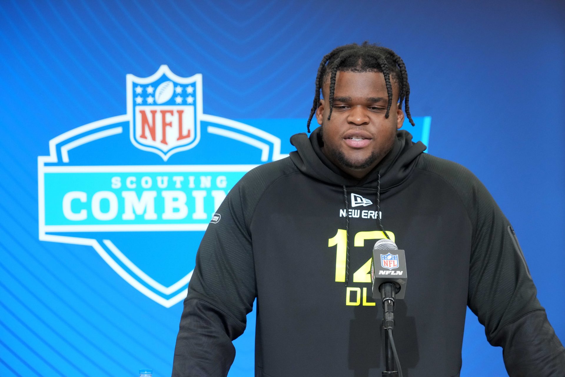Michigan defensive lineman Kenneth Grant (DL12) during the 2025 NFL Scouting Combine at the Indiana Convention Center.