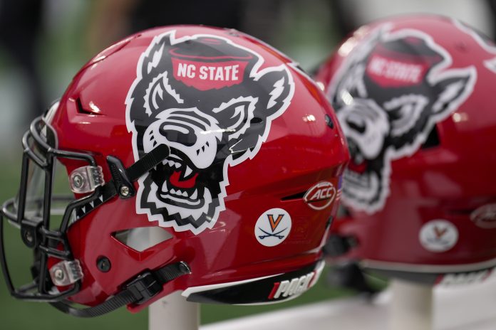 North Carolina State Wolfpack helmets during the first half against the Maryland Terrapins in the 2022 Duke's Mayo Bowl at Bank of America Stadium.