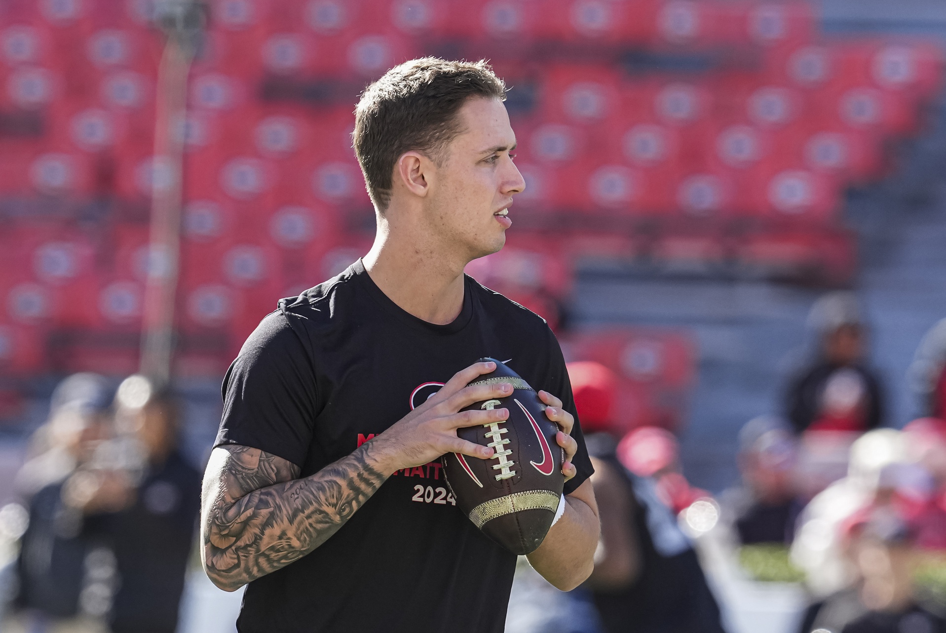 Georgia Bulldogs quarterback Carson Beck (15) shown on the field prior to the game against the Massachusetts Minutemen at Sanford Stadium.