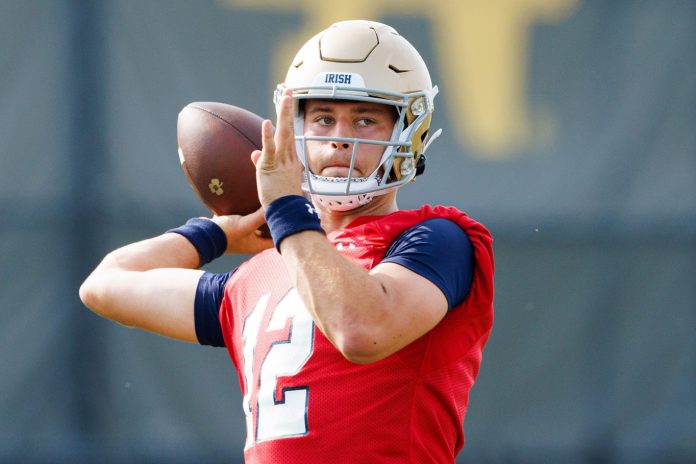 Notre Dame quarterback CJ Carr throws the ball during a Notre Dame football practice at Irish Athletic Center.