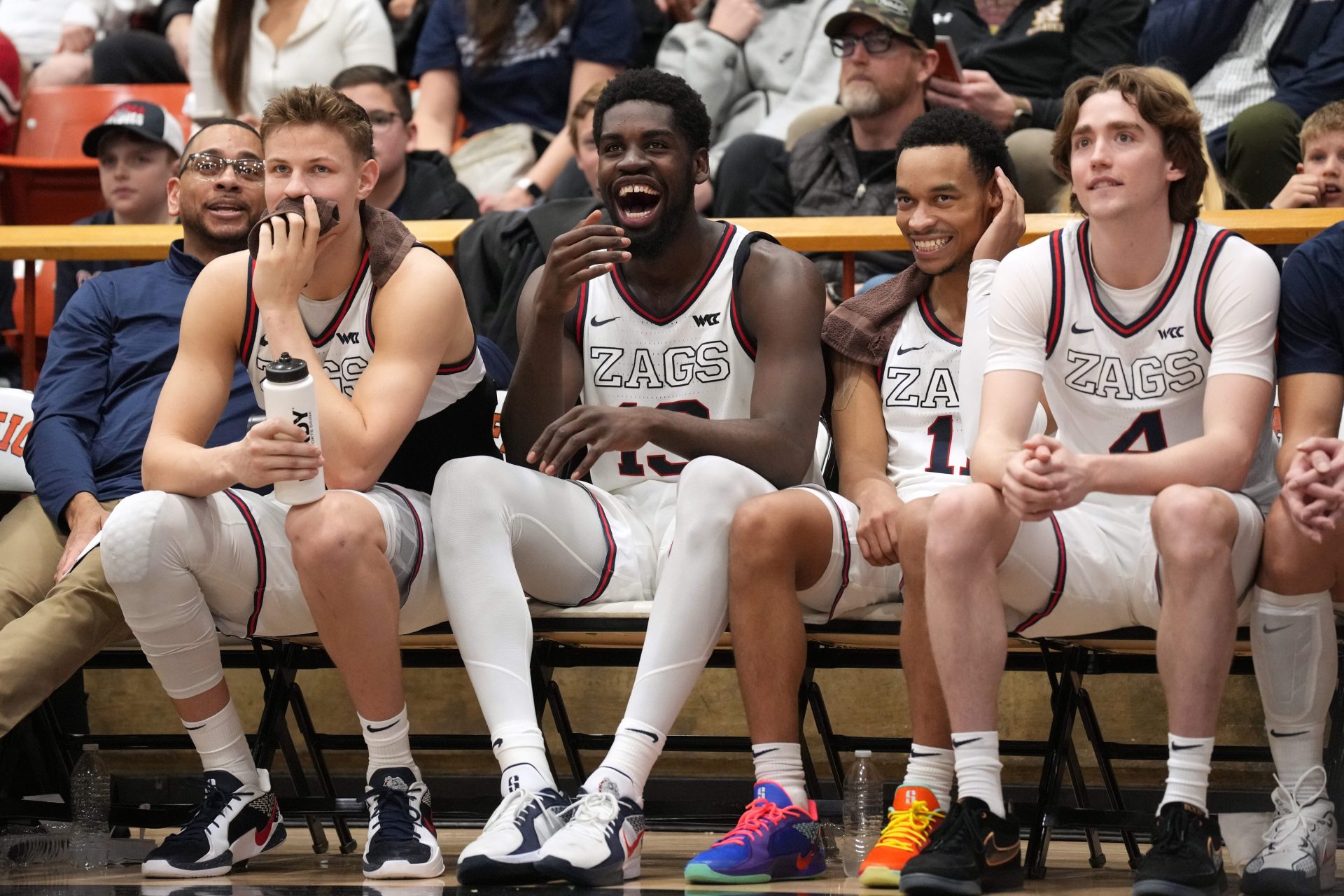 Gonzaga Bulldogs forward Graham Ike (center left) and guard Nolan Hickman (center right) laugh on the bench during the second half against the Pacific Tigers at Alex G. Spanos Center.