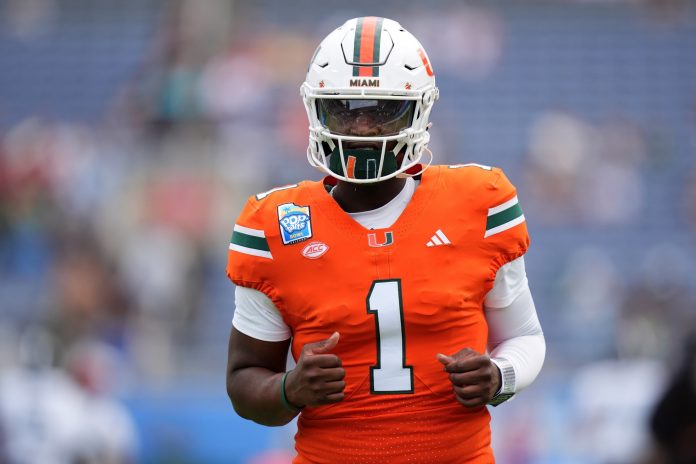 Miami Hurricanes quarterback Cam Ward (1) warms up prior to the game against the Iowa State Cyclones at Camping World Stadium.