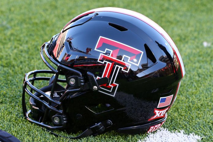 A general view of a Texas Tech Red Raiders helmet on the field before the game between the West Virginia Mountaineers and the Texas Tech Red Raiders at Jones AT&T Stadium and Cody Campbell Field.