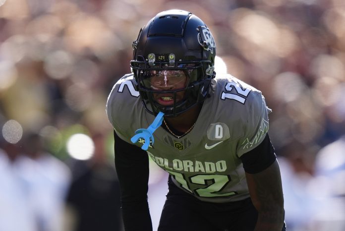 Colorado Buffaloes defensive back Travis Hunter (12) looks on during the first quarter against the Utah Utes at Folsom Field.