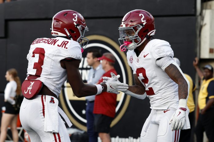 Alabama Crimson Tide wide receiver Emmanuel Henderson Jr. (3) and wide receiver Ryan Williams (2) celebrate after a touchdown against the Vanderbilt Commodores during the second half at FirstBank Stadium.