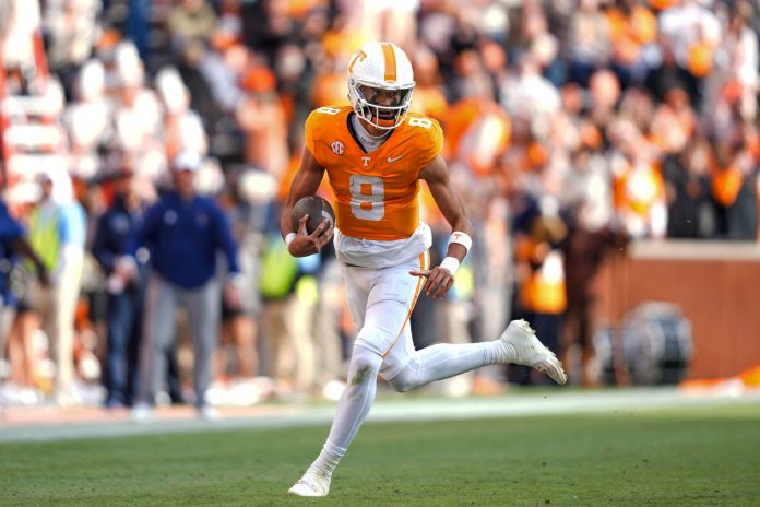 Tennessee Volunteers quarterback Nico Iamaleava (8) runs with the ball against the UTEP Miners at Neyland Stadium.