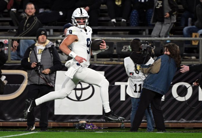 Penn State Nittany Lions quarterback Beau Pribula (9) runs the ball toward the end zone during the second half against the Purdue Boilermakers at Ross-Ade Stadium.