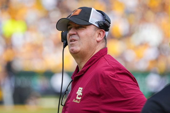 Boston College Eagles head coach Bill O'Brien watches the replay board against the Missouri Tigers during the first half at Faurot Field at Memorial Stadium.