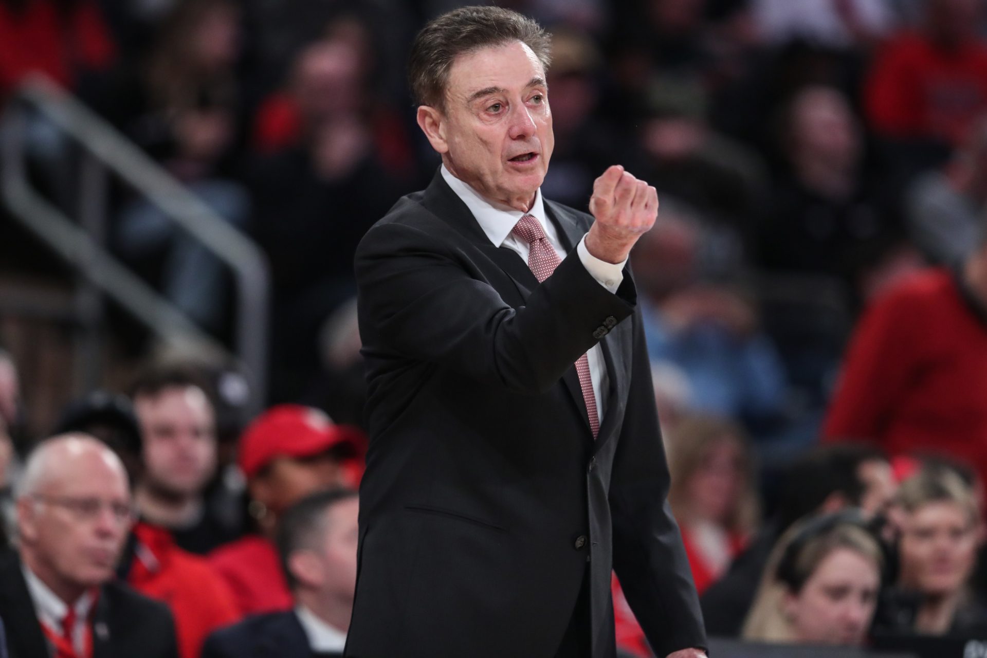 St. John's Red Storm head coach Rick Pitino signals in the second half against the Connecticut Huskies at Madison Square Garden.