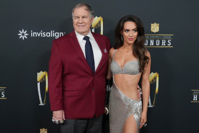 Bill Belichick and Jordon Hudson on the red carpet before Super Bowl LIX NFL Honors at Saenger Theatre.