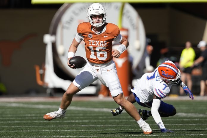 Texas Longhorns quarterback Arch Manning (16) escapes Florida Gators defensive back Trikweze Bridges (7) while looking to pass during the second half at Darrell K Royal-Texas Memorial Stadium.