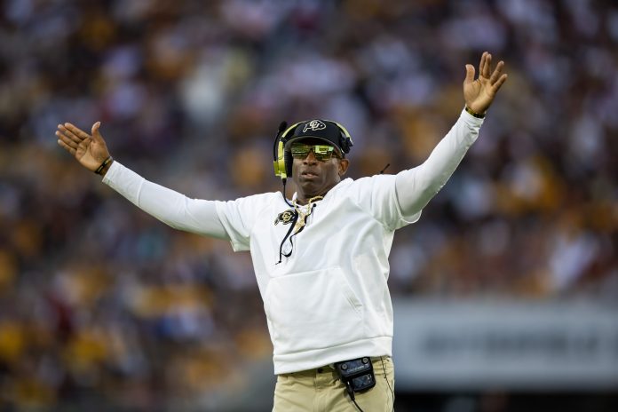 Colorado Buffaloes head coach Deion Sanders reacts against the Arizona State Sun Devils in the second half at Mountain America Stadium.