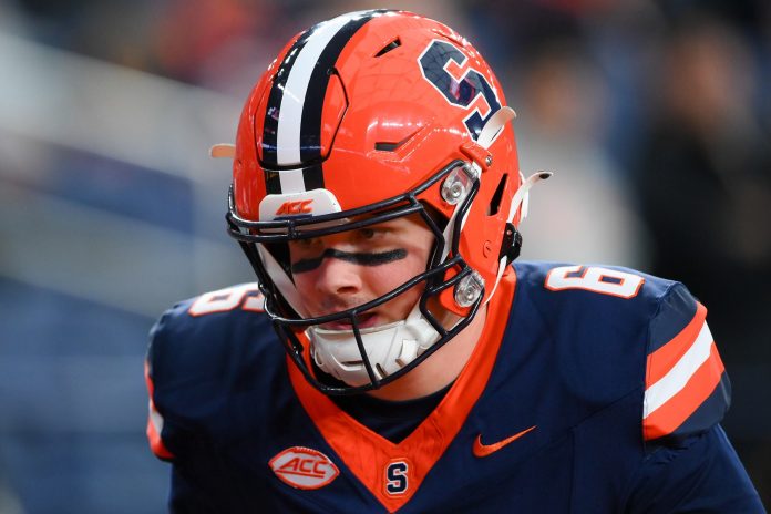 Syracuse Orange quarterback Kyle McCord (6) warms up prior to the game against the Miami Hurricanes at the JMA Wireless Dome.