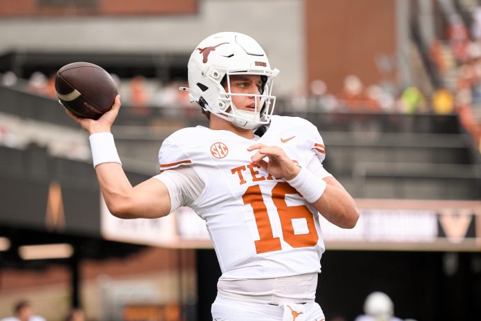 Texas Longhorns quarterback Arch Manning (16) throws against the Vanderbilt Commodores during pregame warmups at FirstBank Stadium.