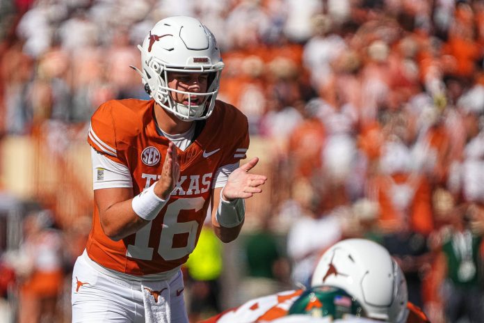 Texas Longhorns quarterback Arch Manning (16) snaps the ball during the game against Colorado State at Darrell K Royal-Texas Memorial Stadium in Austin Saturday, Aug. 31, 2024.