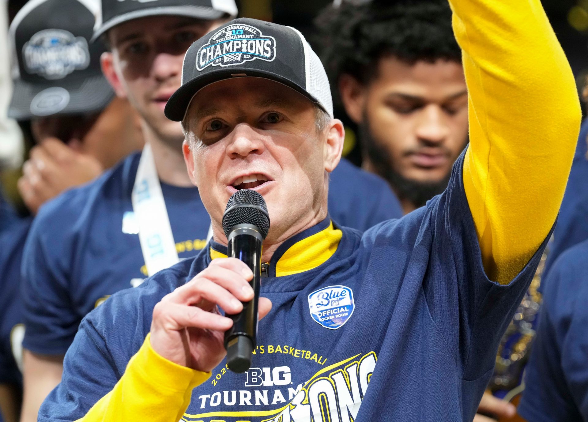 Michigan Wolverines head coach Dusty May speaks after his team defeats the Wisconsin Badgers during the 2025 TIAA Big Ten Men’s Basketball Tournament final game on Sunday, March 16, 2025, at Gainbridge Fieldhouse in Indianapolis.