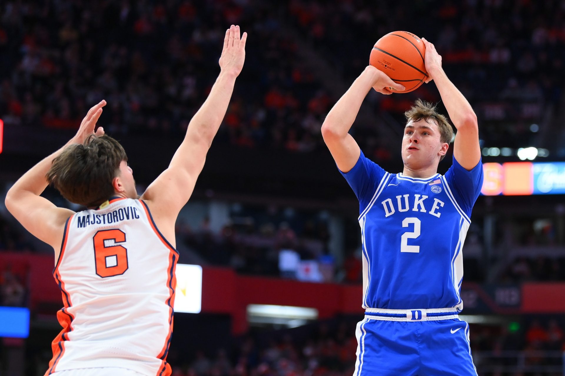 Duke Blue Devils guard Cooper Flagg (2) shoots against Syracuse Orange forward Petar Majstorovic (6) during the first half at the JMA Wireless Dome.