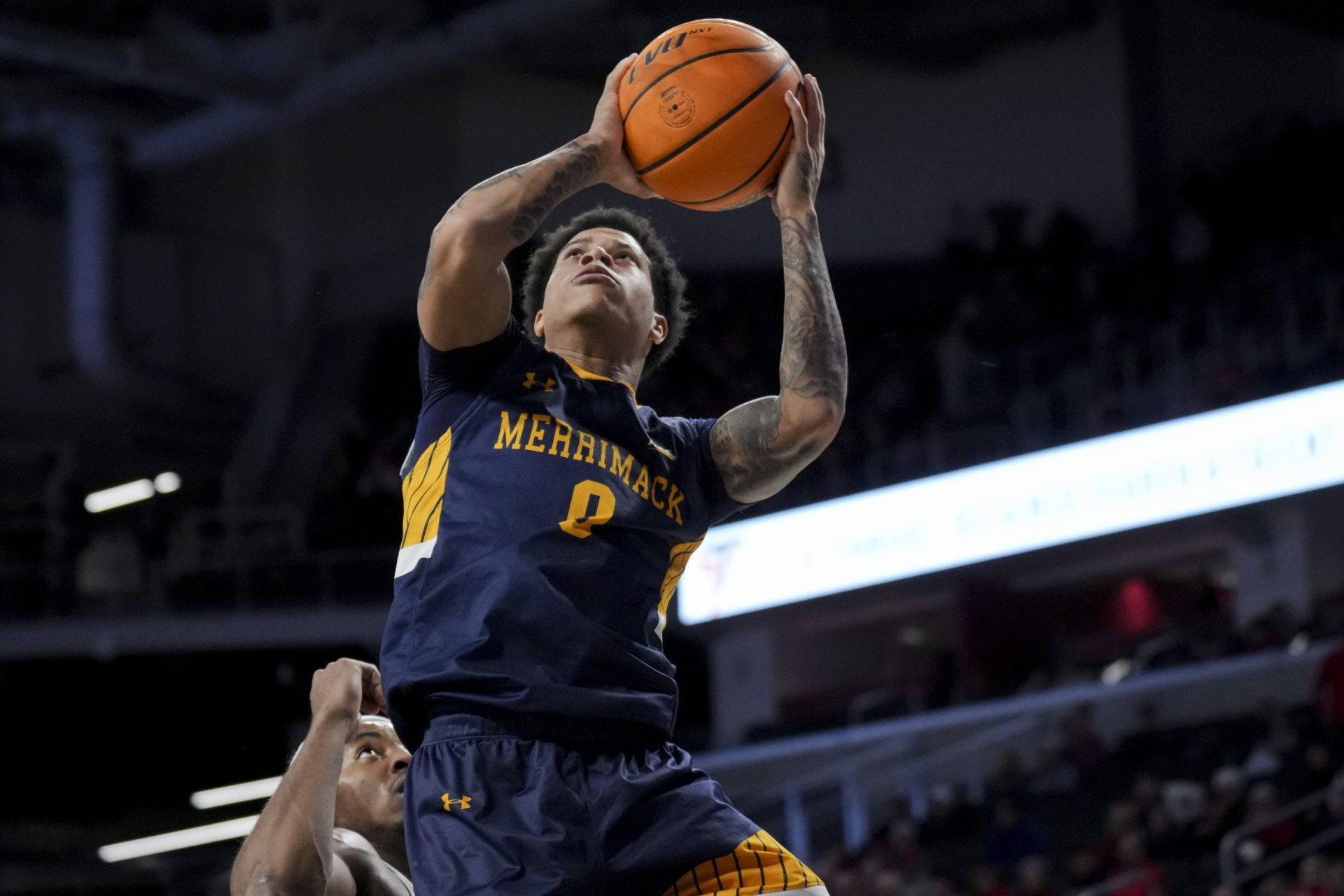 Merrimack Warriors guard Adam Clark (0) drives to the basket against the Cincinnati Bearcats in the second half at Fifth Third Arena.