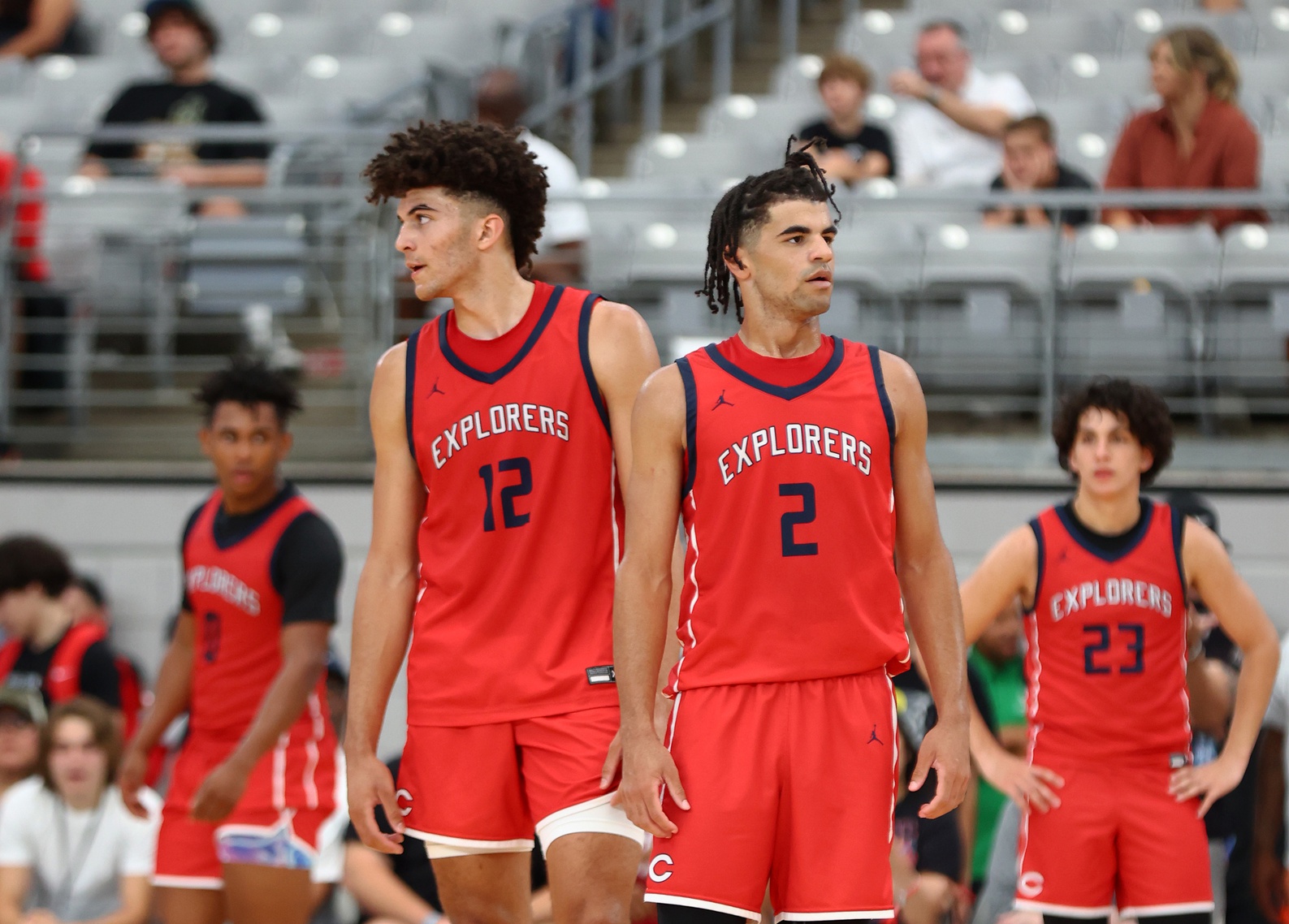 Columbus player Cameron Boozer (12) and brother Cayden Boozer (2) during the Section 7 high school boys tournament at State Farm Stadium.