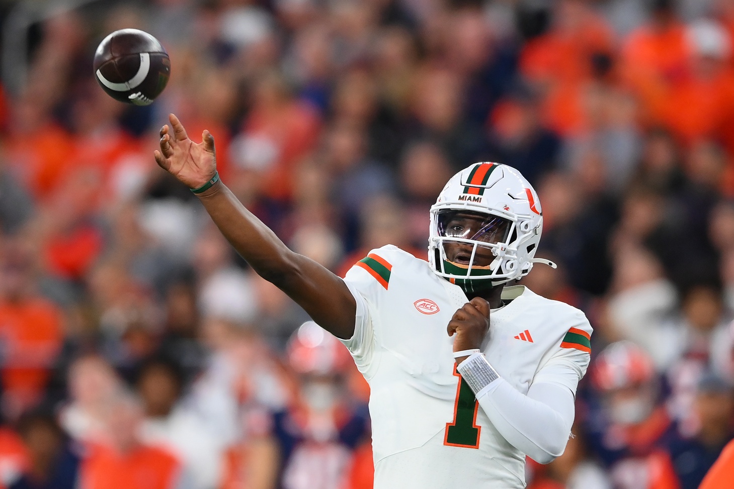 Miami Hurricanes quarterback Cam Ward (1) passes the ball against the Syracuse Orange during the first half at the JMA Wireless Dome.