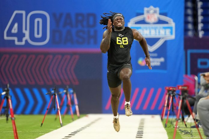 Texas A&M defensive lineman Shemar Stewart (DL68) participates in drills during the 2025 NFL Combine at Lucas Oil Stadium.