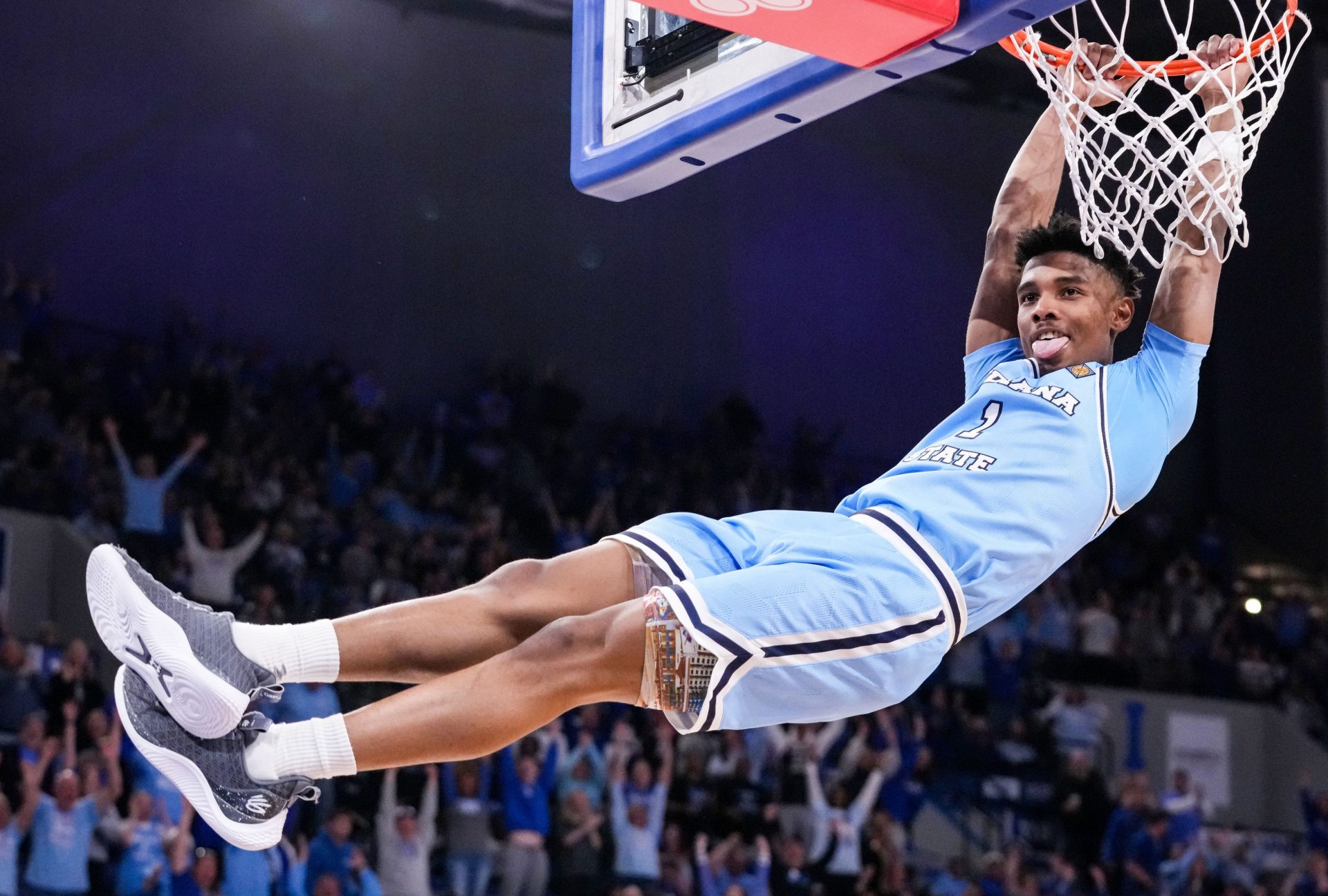 Indiana State Sycamores guard Julian Larry (1) dunks the ball Sunday, March 24, 2024, during the second round of the NIT against the Minnesota Golden Gophers at the Hulman Center in Terre Haute.