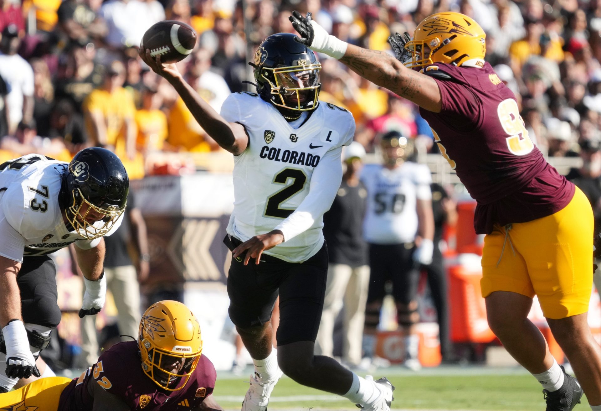 ASU Sun Devils defensive lineman Anthonie Cooper (96) tries to block the pass of Colorado Buffaloes quarterback Shedeur Sanders (2) at Mountain America Stadium on Oct 7, 2023.