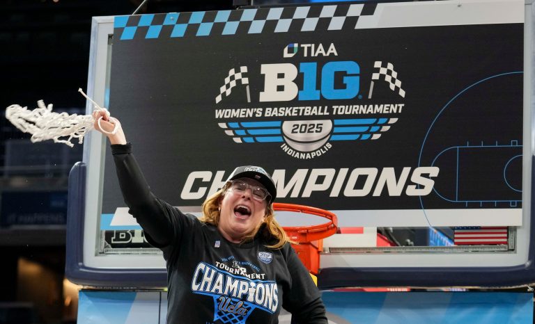 UCLA Bruins head coach Cori Close celebrates after her team defeated the USC Trojans during the 2025 TIAA Big Ten Women's Basketball Tournament final game on Sunday, March 9, 2025, at Gainbridge Fieldhouse in Indianapolis. UCLA defeated USC 72-67.