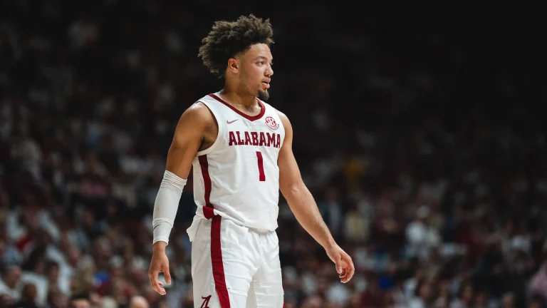 Who will punch their ticket to the Final Four? Dive into our Elite Eight breakdown with bold predictions and key matchups in this thrilling showdown.