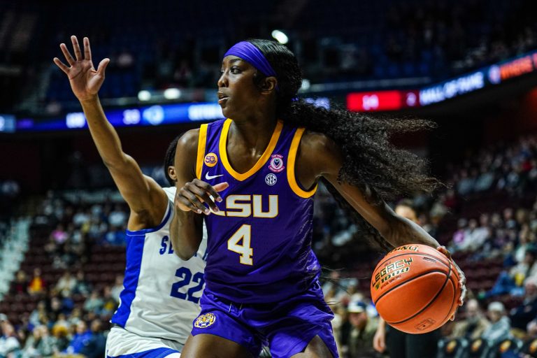 LSU Lady Tigers guard Flau'Jae Johnson (4) moves the ball against Seton Hall Pirates guard Amari Wright (22) in the first half at Mohegan Sun Arena.