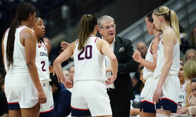 UConn Huskies head coach Geno Auriemma talks to his team from the sideline as they take on the South Dakota State Jackrabbits at Harry A. Gampel Pavilion.