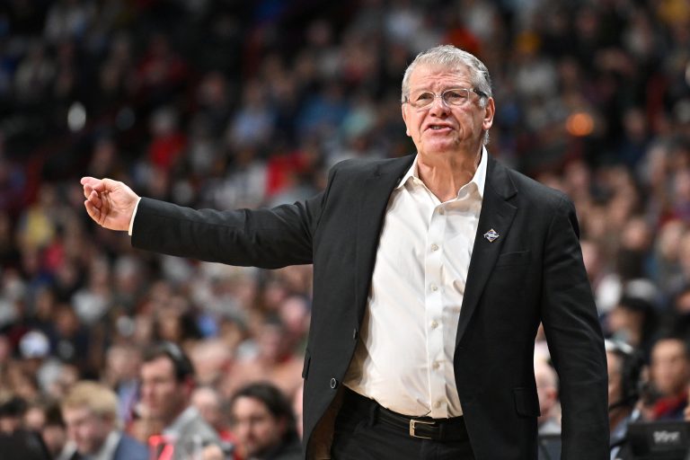UConn Huskies head coach Geno Auriemma directs his team against against the Oklahoma Sooners during the first half of a Sweet 16 NCAA Tournament basketball game at Spokane Arena. at Spokane Arena.