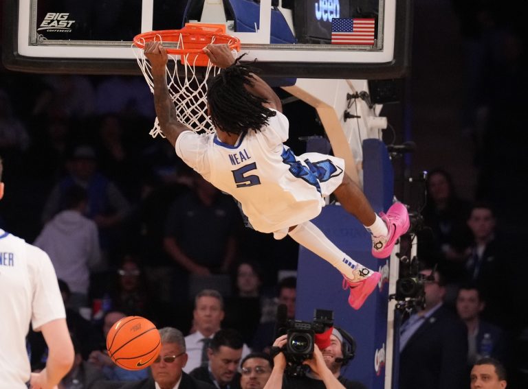 Creighton Bluejays guard Jamiya Neal (5) dunks on Connecticut Huskies as time ran out on the Huskies in the second half at Madison Square Garden.