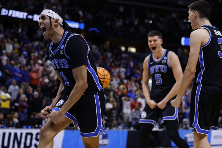 BYU guard Trey Stewart (1) reacts after defeating the Wisconsin Badgers in the second round of the NCAA Tournament at Ball Arena.