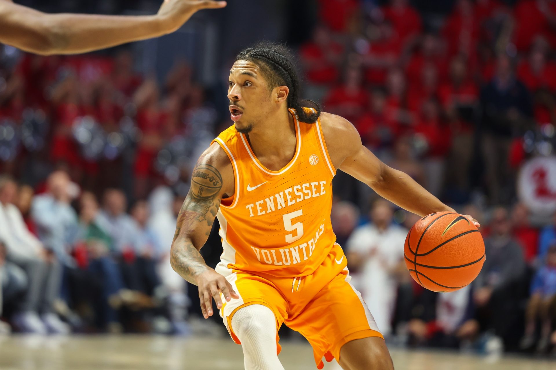 Tennessee Volunteers guard Zakai Zeigler (5) handles the ball against the Mississippi Rebels during the first half at The Sandy and John Black Pavilion at Ole Miss.