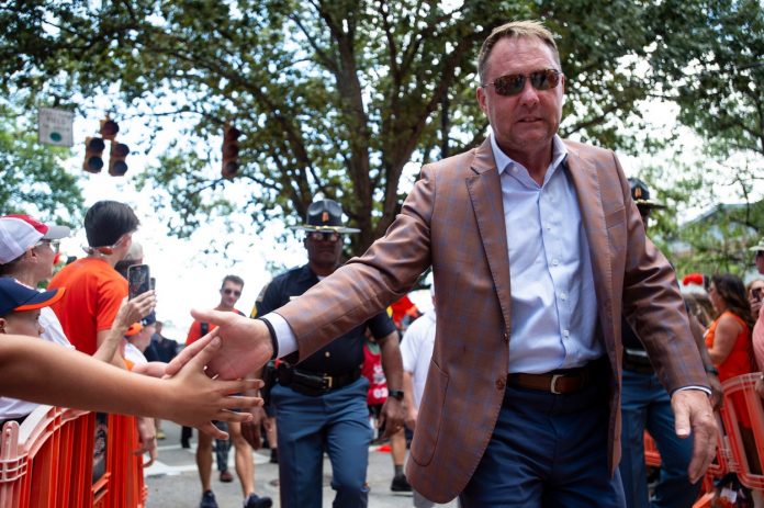 Auburn Tigers head coach Hugh Freeze greets fans during Tiger Walk before Auburn Tigers take on Oklahoma Sooners at Jordan-Hare Stadium in Auburn, Ala., on Saturday, Sept. 28, 2024.