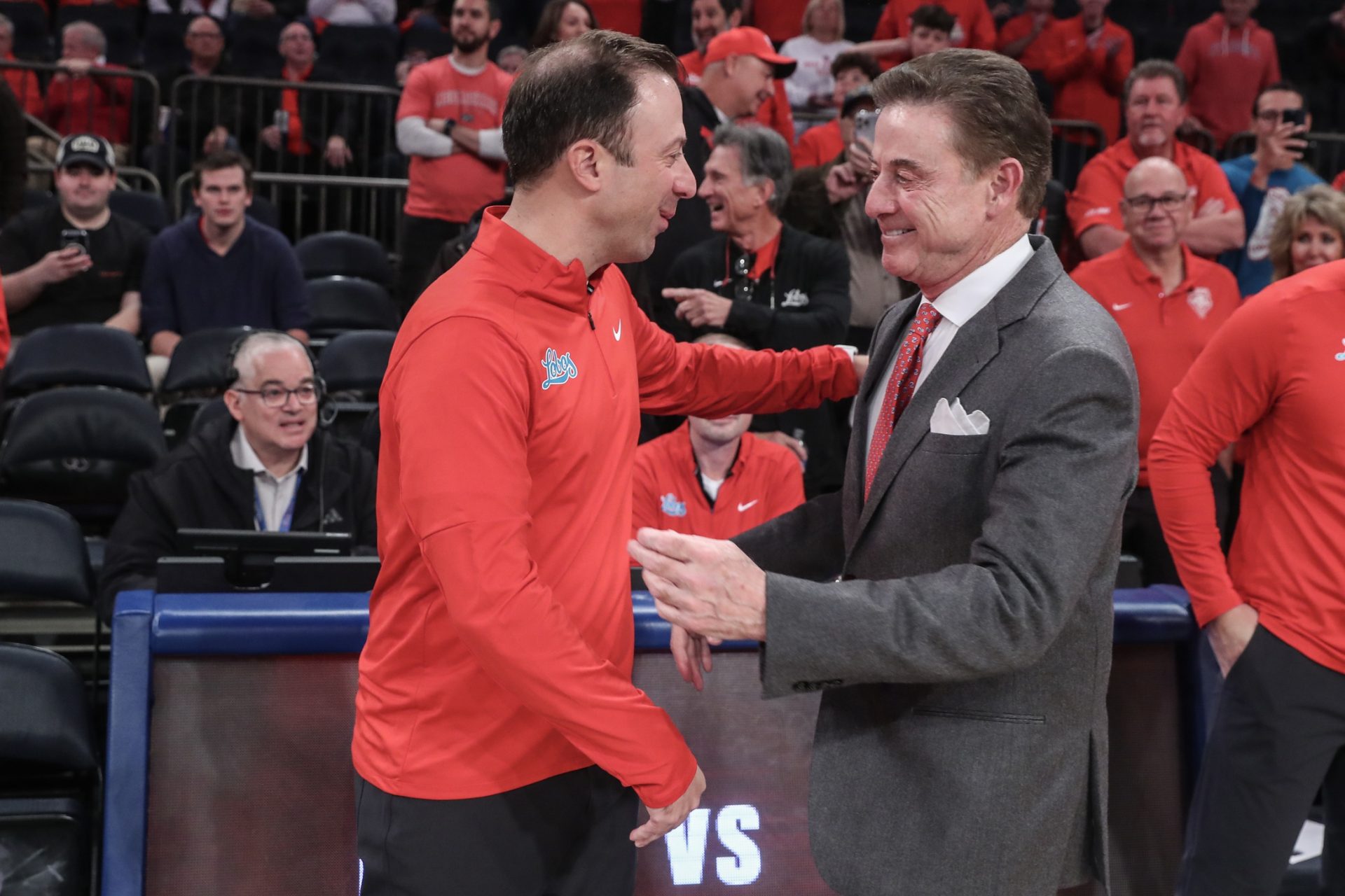 New Mexico Lobos head coach Richard Pitino and St. John's Red Storm head coach Rick Pitino greet each other prior to the start of the game at Madison Square Garden.