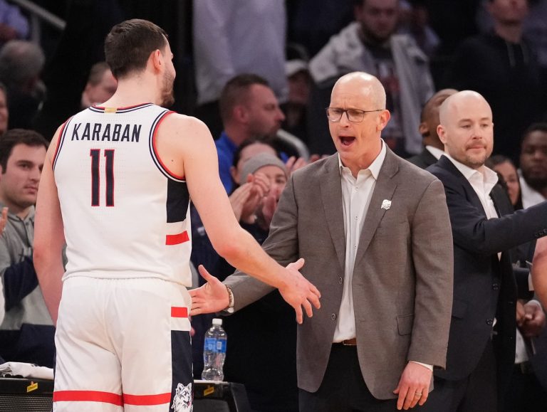 UConn head coach Dan Hurley greets Connecticut Huskies forward Alex Karaban (11) after he left the game late in the 2nd half against the Villanova Wildcats at Madison Square Garden.