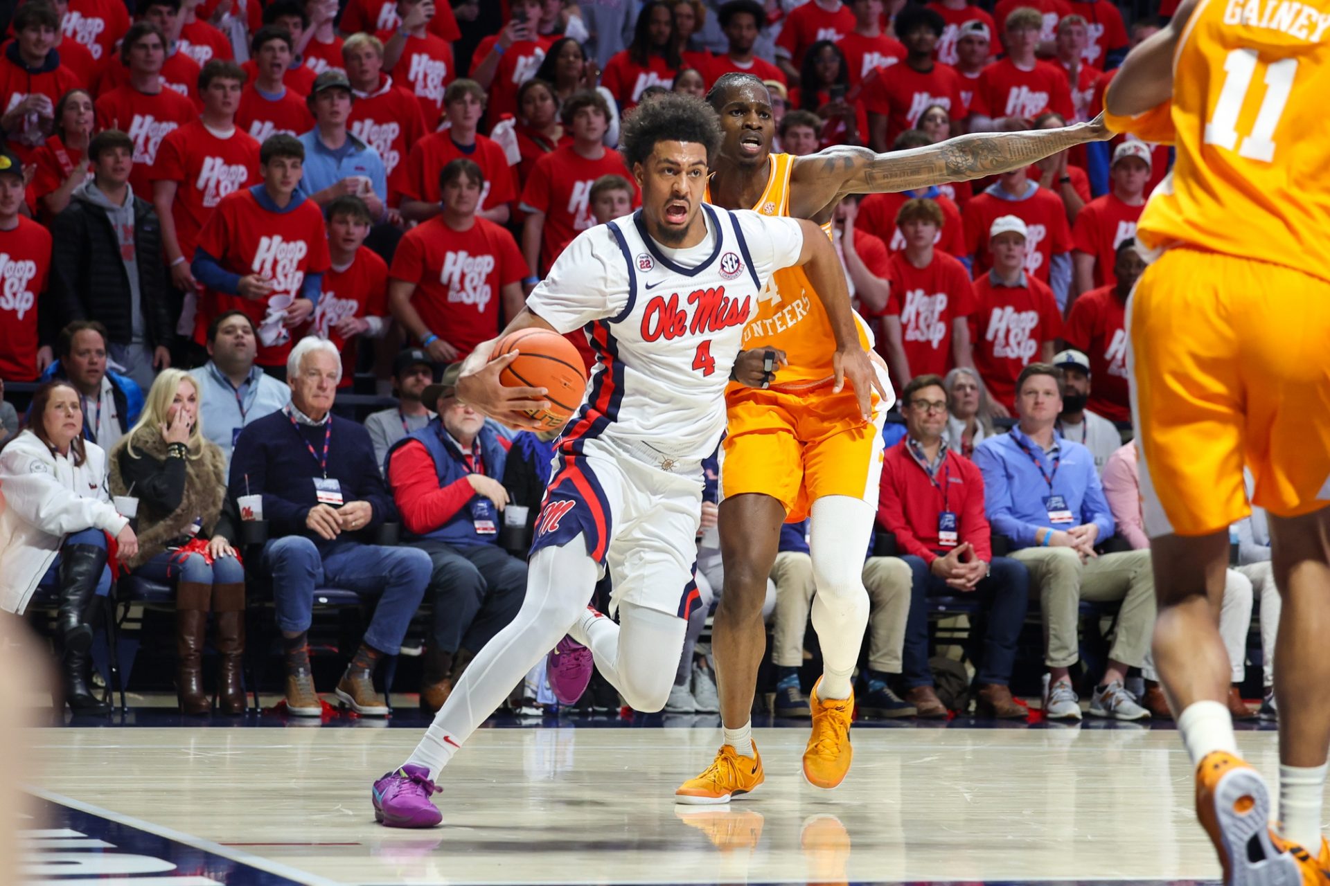 Mississippi Rebels forward Jaemyn Brakefield (4) drives to the basket against Tennessee Volunteers forward Felix Okra (34) during the second half at The Sandy and John Black Pavilion at Ole Miss.