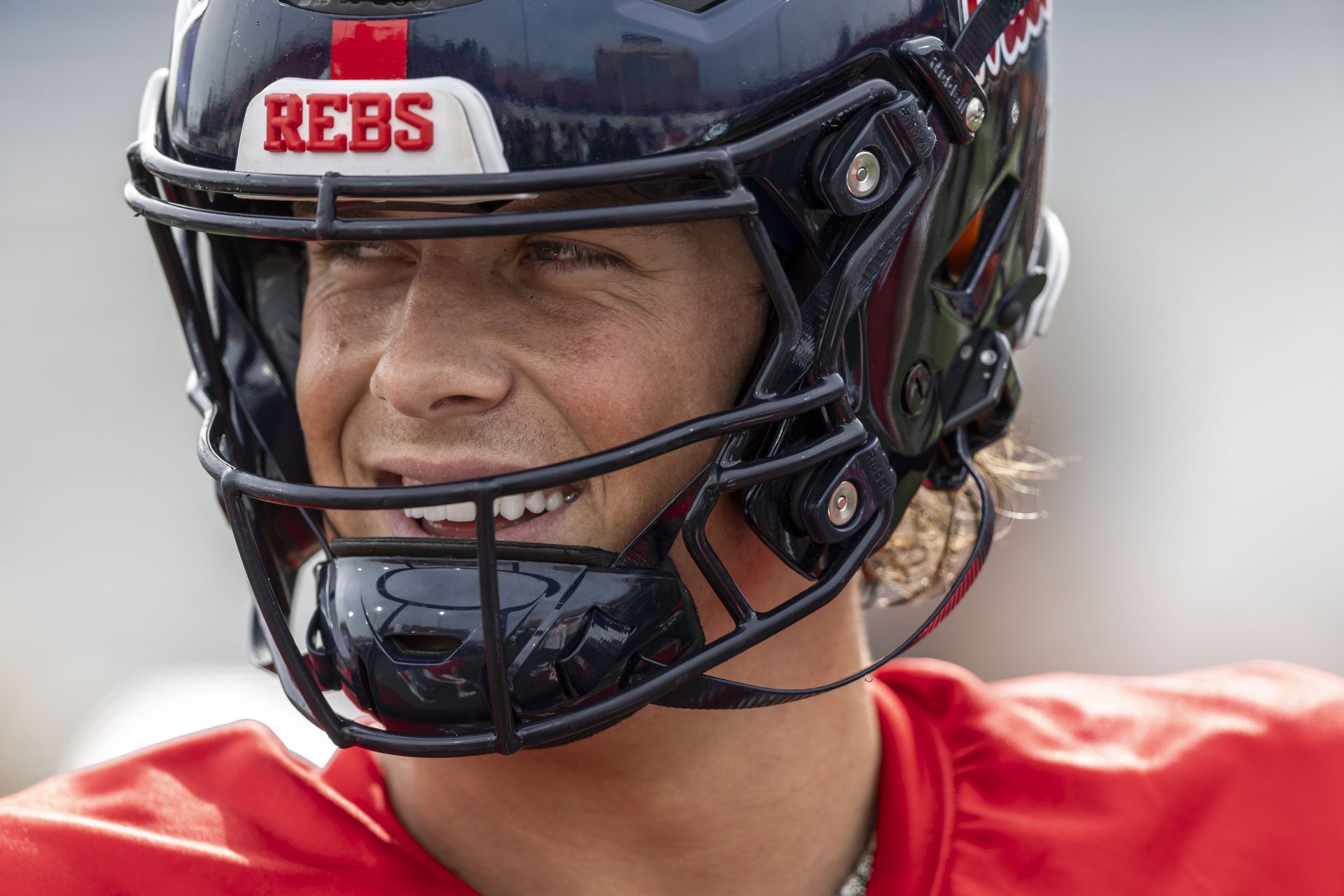Jan 28, 2025; Mobile, AL, USA; American team quarterback Jaxson Dart of Ole Miss (2) interacts with teammates during Senior Bowl practice for the American team at Hancock Whitney Stadium. Mandatory Credit: Vasha Hunt-Imagn Images