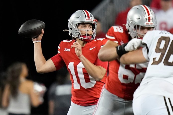 Ohio State Buckeyes quarterback Julian Sayin (10) throws a pass during the second half of the NCAA football game against the Western Michigan Broncos at Ohio Stadium.