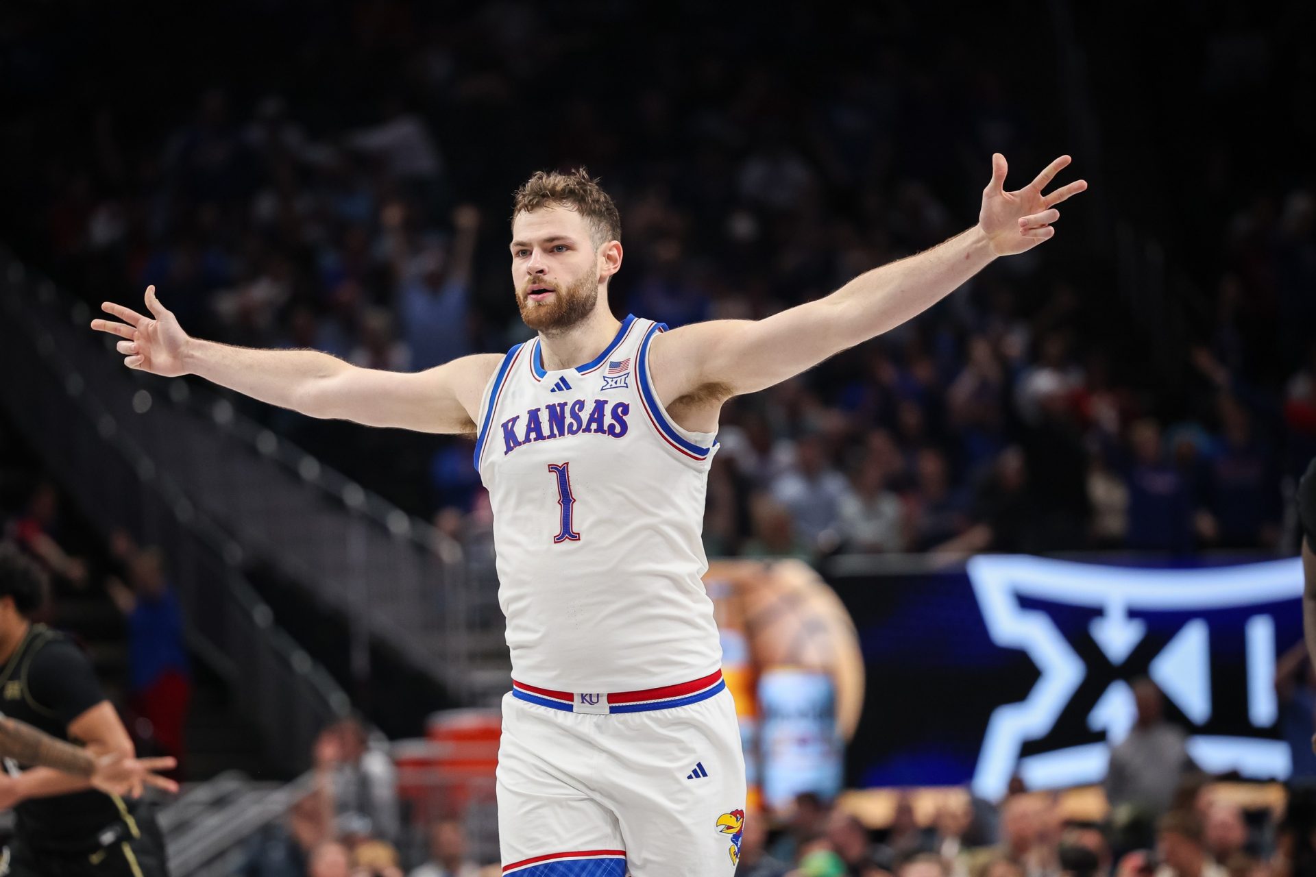 Kansas Jayhawks center Hunter Dickinson (1) reacts after a play during overtime against the UCF Knights at T-Mobile Center.