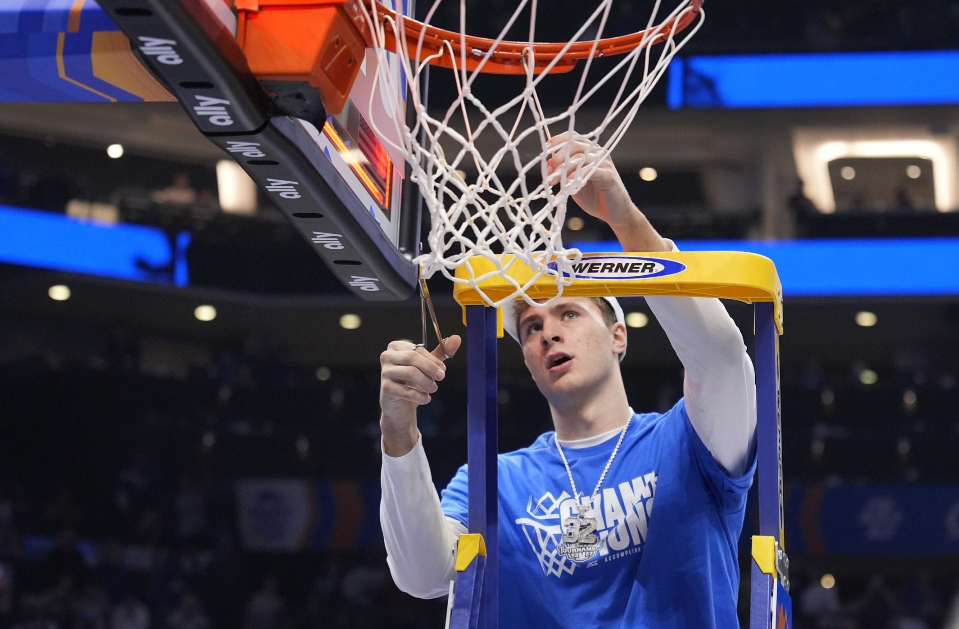 Duke Blue Devils forward Cooper Flagg (2) cuts the net after winning the 2025 ACC Conference Championship game against the Louisville Cardinals at Spectrum Center.