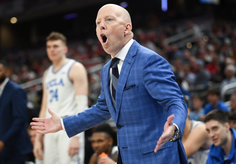 UCLA Bruins head coach Mick Cronin reacts to a call during the second half against the Wisconsin Badgers at Gainbridge Fieldhouse.