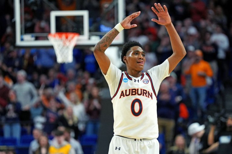 Auburn Tigers guard Tahaad Pettiford (0) celebrates during the second half against the Creighton Bluejays in the second round to the NCAA Tournament at Rupp Arena.