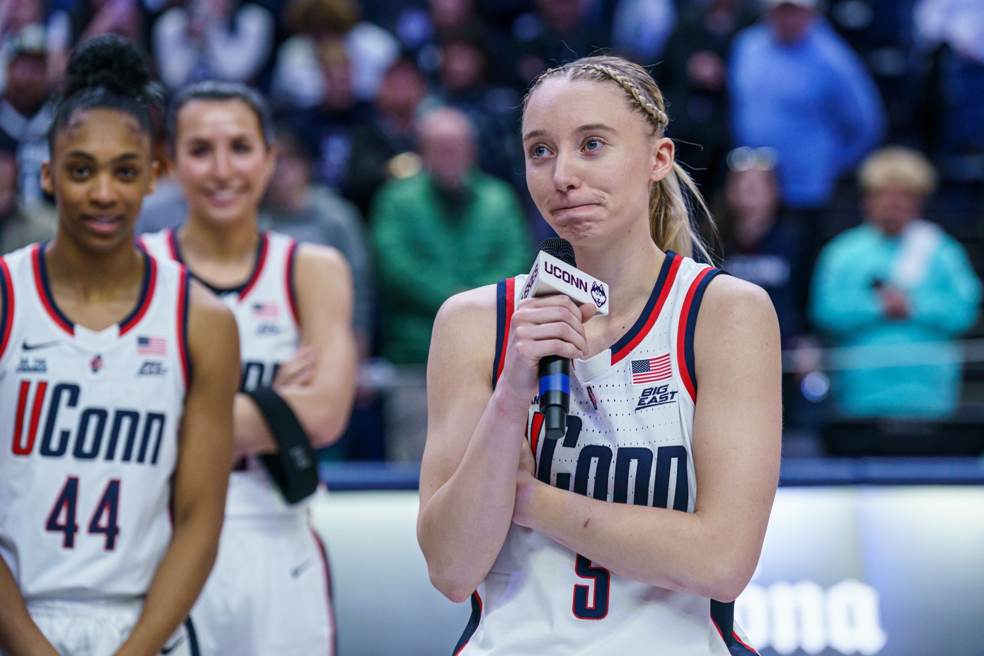 UConn Huskies guard Paige Bueckers (5) talks to the fans during senior night after the game against the Marquette Golden Eagles at Harry A. Gampel Pavilion.