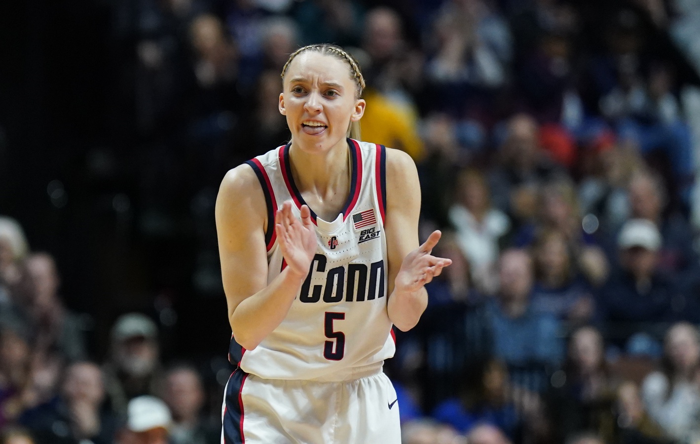 UConn Huskies guard Paige Bueckers (5) reacts after a play against the Creighton Bluejays in the first half at Mohegan Sun Arena.