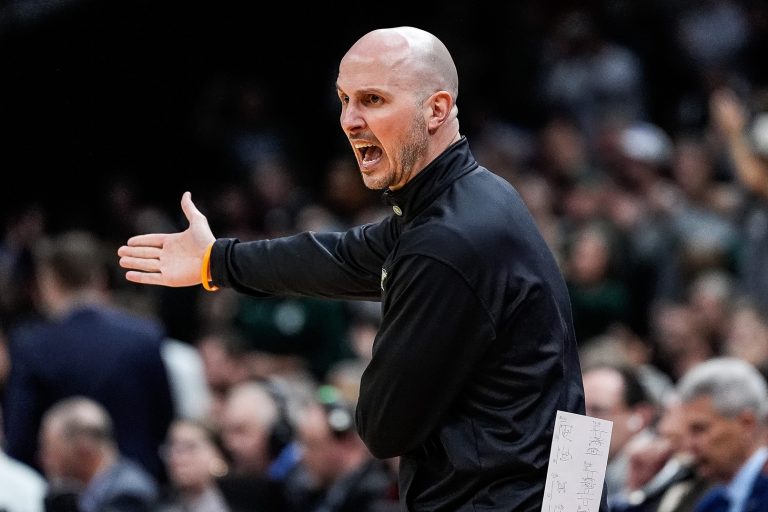 Bryant head coach Phil Martelli Jr. reacts to a play against Michigan State during the first half of the First Round of NCAA Tournament at Rocket Arena in Cleveland, Ohio on Friday, March 21, 2025.