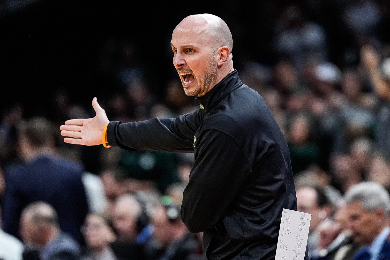 Bryant head coach Phil Martelli Jr. reacts to a play against Michigan State during the first half of the First Round of NCAA Tournament at Rocket Arena in Cleveland, Ohio on Friday, March 21, 2025.